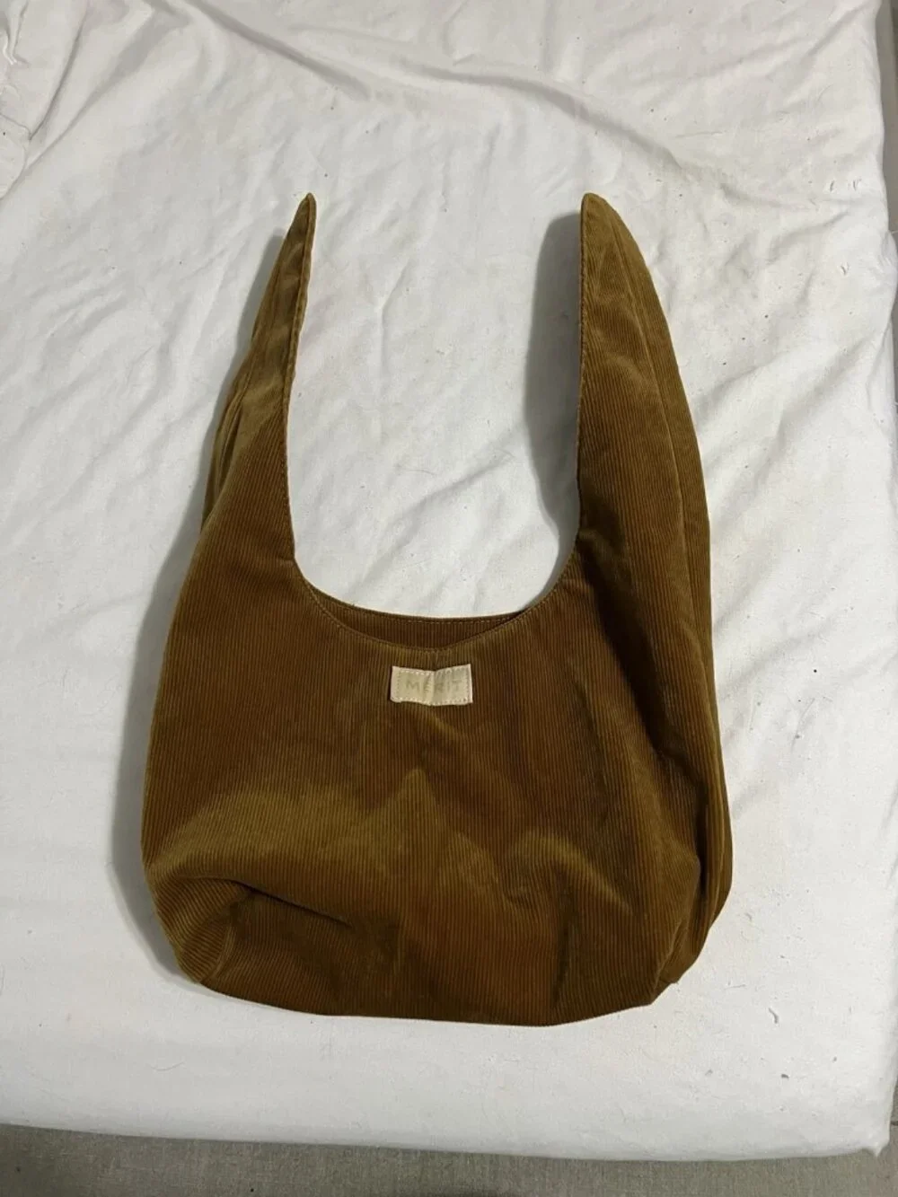 MERIT Beauty corduroy tie bag knapsack makeup bag Brown Tan